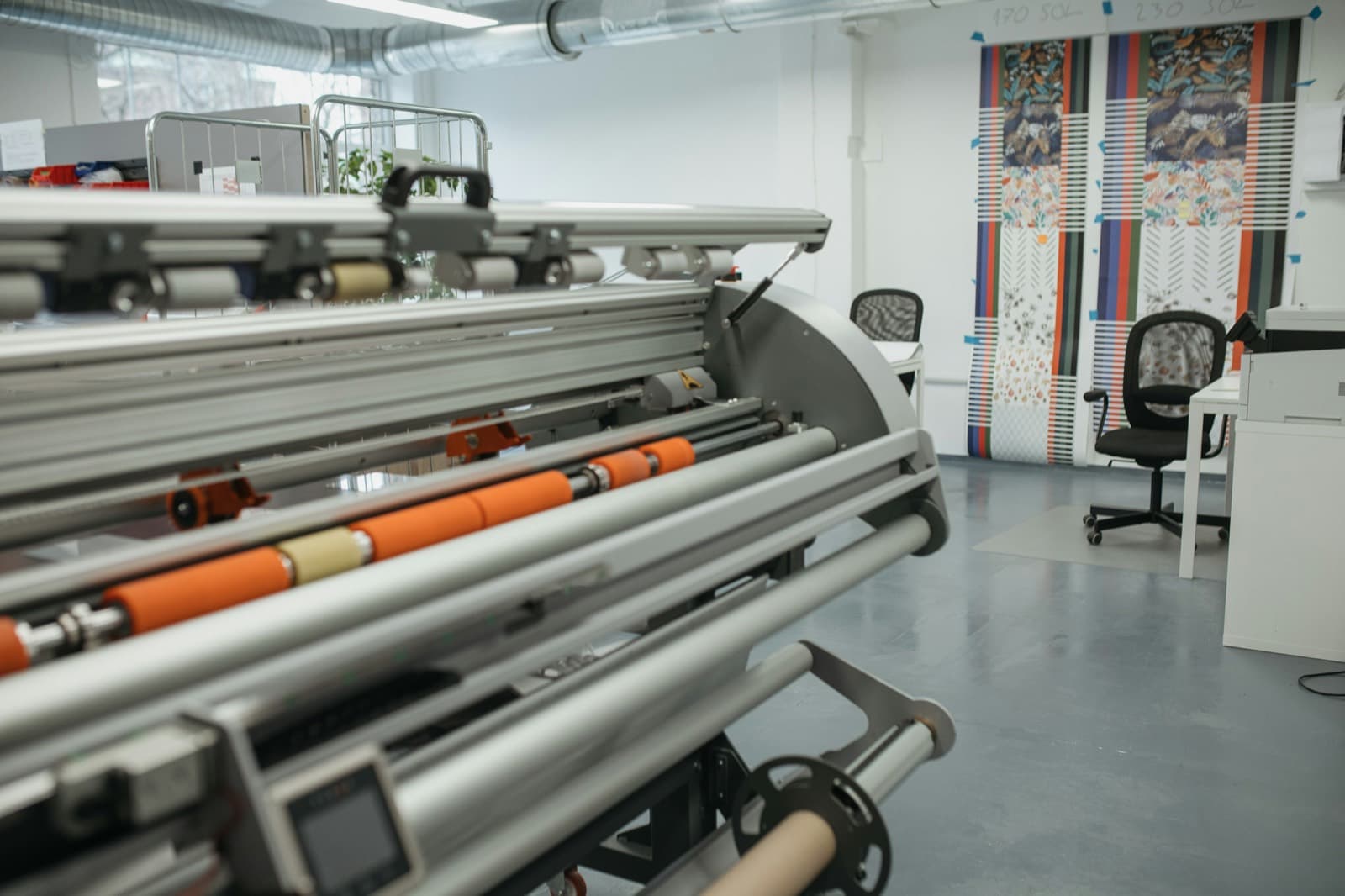 A large-format printer in a print studio